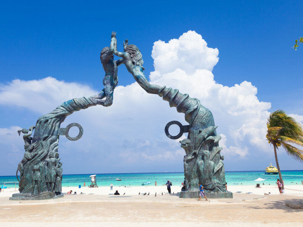 The Portal Maya sculpture on the beach at Playa del Carmen